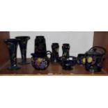 A collection of Royal Stanley ware Jacobean pattern pottery, including vases, jug etc