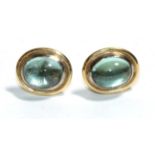 A pair of 18 carat gold aquamarine earrings, with post fittings . Gross weight - 5.67 grams.