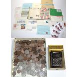 A quantity of coins and stamps