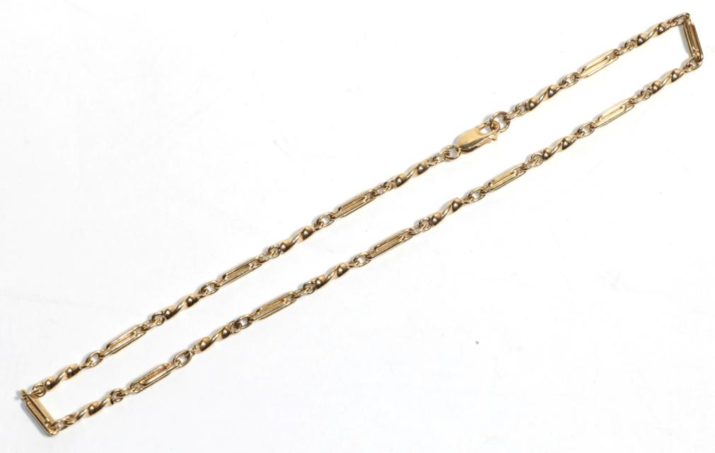 A 9 carat gold fancy link chain, length 41cm . Gross weight - 17.27 grams.