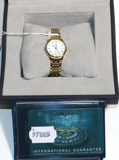 A lady's bi-metal Longines wristwatch link bracelet, Roman dial with date aperture, plus documents