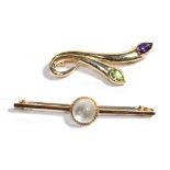 A moonstone brooch, stamped '9ct', length 5cm; a 9 carat gold amethyst and peridot brooch, length