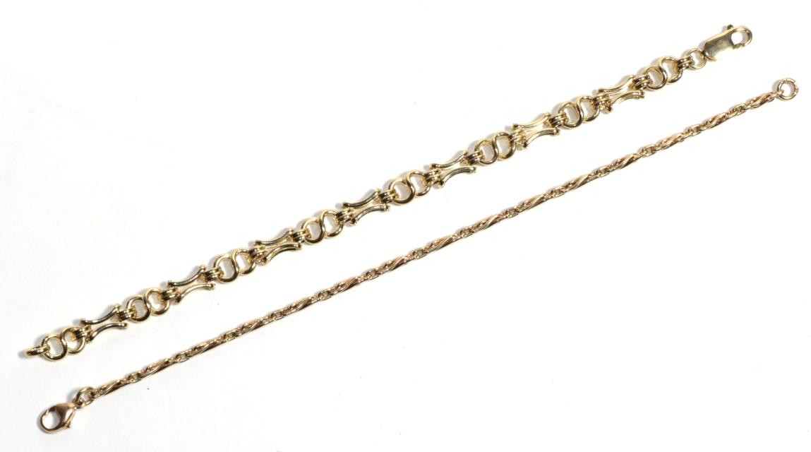 Two 9 carat fancy link gold bracelets, both 19cm long (2). Gross weight - 16.74 grams.