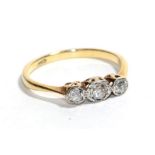 An old cut diamond three stone ring, total estimated diamond weight 0.35 carat approximately, finger