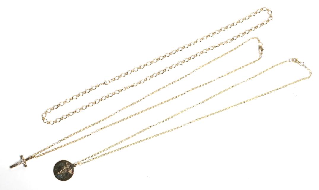 A 9 carat gold crucifix pendant on a 9 carat gold chain, pendant length 2.5cm, length 51cm; a 9
