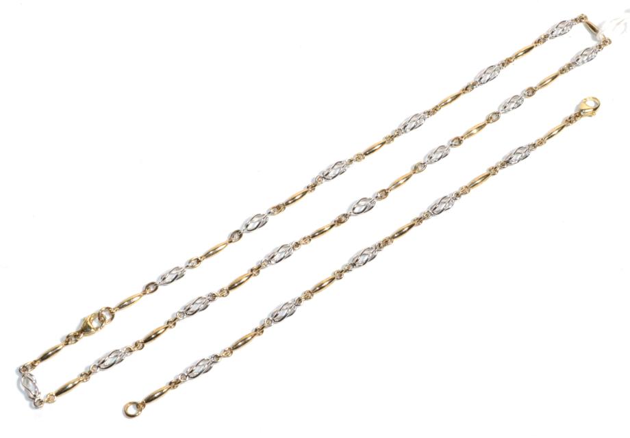 A 9 carat two colour gold fancy link necklace, length 46cm and a matching bracelet, length 18.5cm (