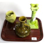 A Burmantofts Faience pottery candlestick, lime glaze, impressed factory mark and 1198, 21cm; a