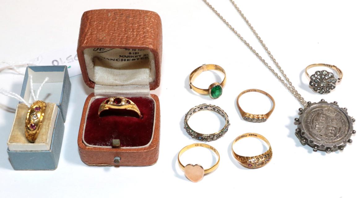 Seven assorted gem and paste set rings (four with re-sizing adjusters present) (a.f.) and a coin