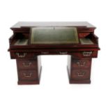 A George III Mahogany Pedestal Writing/Architect's Table, after a model by Gillows, early 19th