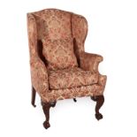 ^ A Wing-Back Armchair, stamped Gillows & Co, 3rd quarter 19th century, in George II style,