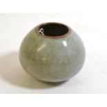 A Chinese Guan Type Lotus Bud Water Pot, Qing Dynasty, with allover crackling to the glaze, 7cm high