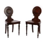 ^ A Pair of George III Mahogany Hall Chairs, possibly by Gillows, early 19th century, with