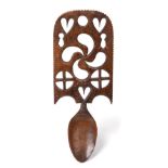 A Welsh Fruitwood Love Spoon, mid 19th century, the broad stem carved and pierced with hearts,