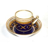 A Sèvres Porcelain Coffee Can and Saucer, date letter K for 1763, gilt and jewelled with foliate