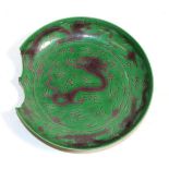 A Chinese Porcelain Green Ground Aubergine Dragon Dish, Kangxi reign mark and of the period, similar