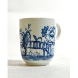 A Worcester Porcelain Coffee Cup, circa 1755, painted in underglaze blue with a fenced garden