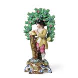 A Staffordshire Pearlware Figure of a Tree Grafter, possibly Walton, circa 1820, the standing figure