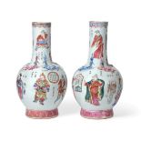 A Pair of Chinese Porcelain Bottle Vases, Qing Dynasty, 19th century, with cylindrical necks, the