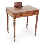 ^ A Gillows of Lancaster Mahogany Writing Table, early 19th century, with hinged cover enclosing