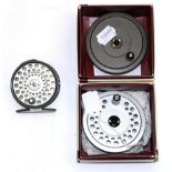 A Hardy, The Featherweight, 2 7/8 in., alloy trout fly reel, ebonite handle, plated line guide,
