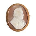 A Victorian Cameo Brooch, the shell carved to depict a gentleman, a picture enclosed in the locket