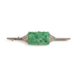 An Art Deco Jade and Diamond Bar Brooch, the oblong pierced jade depicting fruits, with a triangular