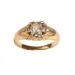 A Diamond Ring, an old mine cut diamond held in six yellow claws, each inset with two rose cut