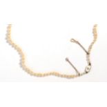 A Cultured Pearl Necklace, the off-round cultured pearls graduate to an octagonal clasp with white