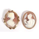 A Cameo Brooch, depicting a lady reading with a ruffle collar, measures 4.7cm by 6.1cm; and A