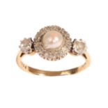 A Pearl and Diamond Ring, circa 1900, a central cluster comprised of a half pearl within a border of