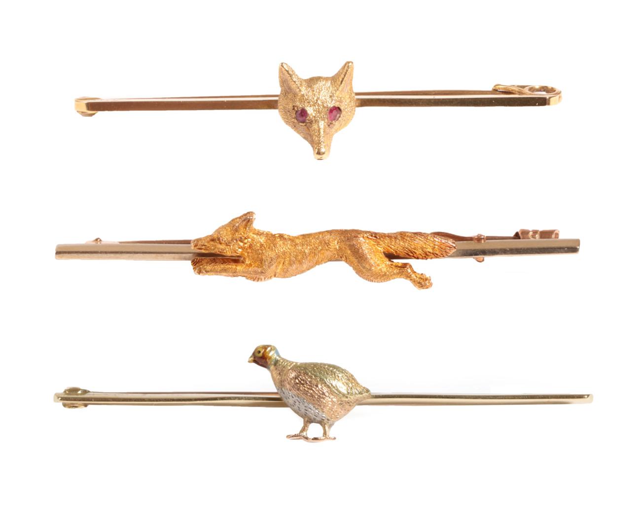 Three Bar Brooches; one depicting a fox mask, one a running fox and the third a grouse (3). The