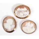 Three Cameo Brooches, one depicting a scene with carriages, in an oval frame with lozenge detail