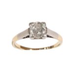 An Early 20th Century Diamond Solitaire Ring, the round brilliant cut diamond in a squared setting