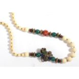 A Chinese Ivory, Coral and Enamel Necklace, graduated round ivory beads, a shaped coral and other