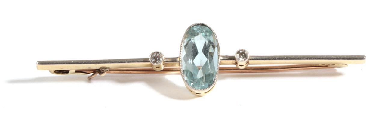 An Aquamarine and Diamond Bar Brooch, an elongated oval aquamarine within a white millegrain