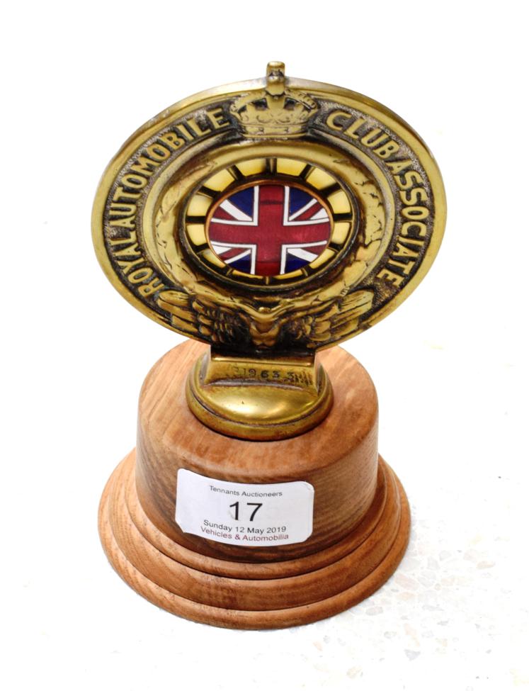 A 1920/30s Brass and Enamel RAC Associate Car Badge, numbered 319653, mounted on a later wooden