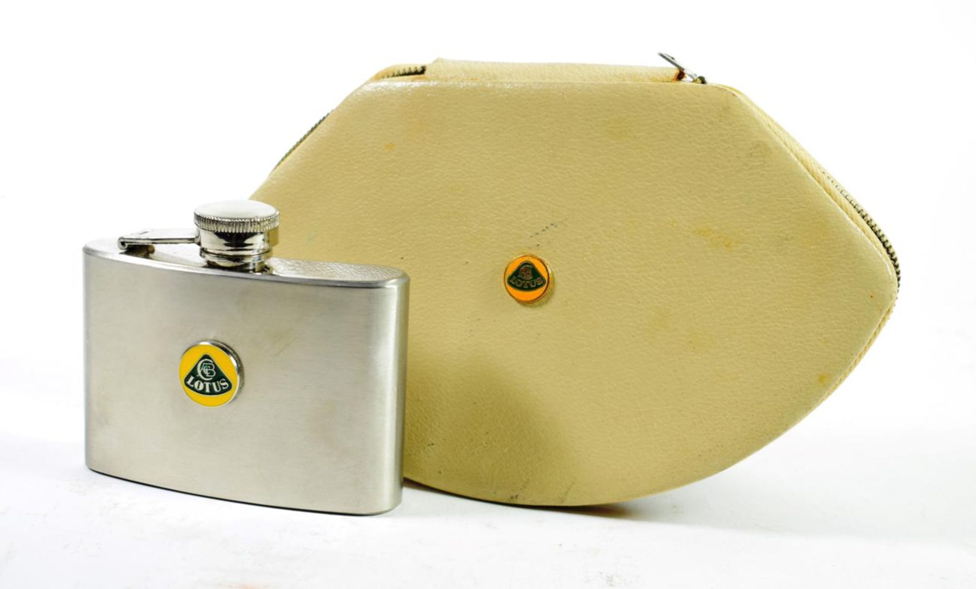 Lotus Interest: A 1950/60 Accessory Cream Leather Manicure Set; and A 1970's Stainless Steel 4oz