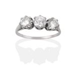 A Diamond Three Stone Ring, three round brilliant cut diamonds in white claw settings, to a