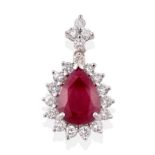 A Ruby and Diamond Cluster Pendant, a pear cut ruby within a border of round brilliant cut