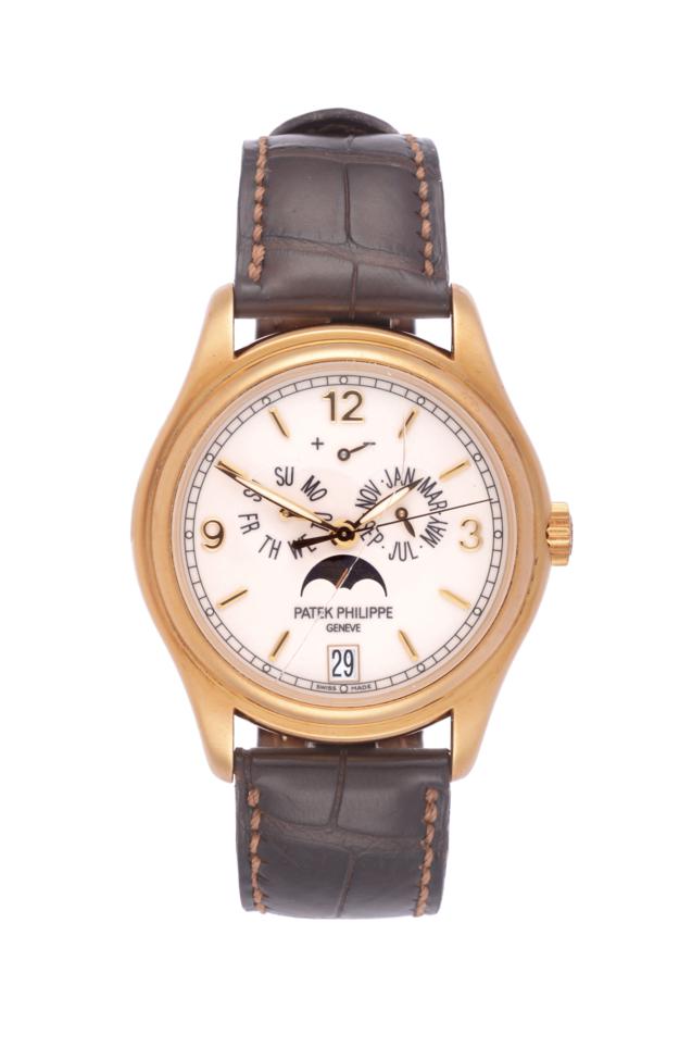 A Fine 18ct Yellow Gold Automatic Annual Calendar Centre Seconds Wristwatch with Power Reserve