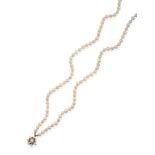 A Two Row Cultured Pearl Necklace, the 59:63 pearls knotted to a clasp comprised of a central