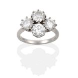 A Diamond Four Stone Cluster Ring, four round brilliant cut diamonds in white claw settings, to a