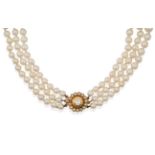 A Three Strand Cultured Pearl Necklace, with a Diamond and Seed Pearl Clasp, the 57:61:63 uniform