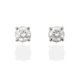 A Pair of 18 Carat Gold Diamond Solitaire Earrings, the round brilliant cut diamonds in white