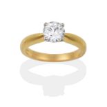 An 18 Carat Gold Diamond Solitaire Ring, the round brilliant cut diamond in a white four claw