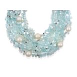 An Aquamarine and South Sea Cultured Pearl Torsade Necklace, multiple rows of faceted pear shaped