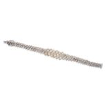 A Diamond Bracelet, of two rows comprised of marquise cut, pear cut and oval cut diamonds in white