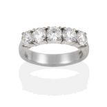 A Platinum Diamond Five Stone Ring, the round brilliant cut diamonds in claw settings, on a plain