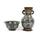 A Chinese Cloisonné Vase, Qing Dynasty, of baluster form, the square neck with loop handles,