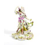A Derby Porcelain Figure of Diana, circa 1765, wearing flowing robes, her hound at her feet, on a